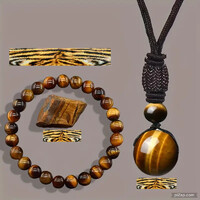 NAGYON AKCIÓS. !! TIGRIS SZEM GYÖNGYBŐL KÉSZÜLT ÉKSZERSZETT.