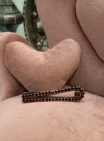 Antique gold-plated silver tie pin with garnets