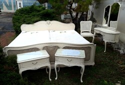 Italian neo-baroque bed, bedside table, mirror, chair./ White bedroom set.