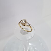 Új, 14 karátos, Virágmintás, Cirkónia köves, eljegyzési gyűrű. (No. 329.)