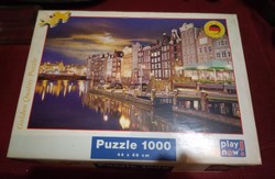1000 piece puzzel all pieces are included. Great idea for the Holidays