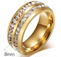 ESKÜVŐ ELJEGYZÉS GYR03 - 2 soros kristály köves arany színű acél karikagyűrű