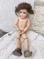 Antik porcelán biszkvit fejű baba jelzett fa testű , eredeti àllapotban, üveg szem , csuklós test..