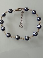 Kék szem karkötő 1/2 cm átmérőjű szemekkel aranyozott láncon, 23 cm hosszú