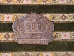 Balesetmentesen plakett