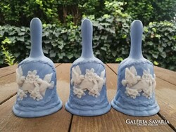 Unmarked but reminiscent of Wedgwood treasures, richly patterned cameo-like dove and flower ornament