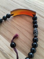 Karkötő - " plexi borostyánnal.  / uniszex