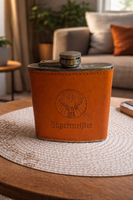Stainless steel Jagermeister flask with leather cover.