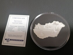 Magyarország alakú érem veret