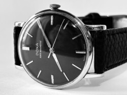 1962 black dial doxa serviced 103-point, new leather strap, scratch-free, 35 mm diameter.