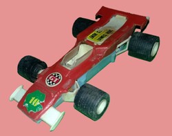 Retro trafikáru magyar bakelit kisipari bazáráru F1 verseny autó JAMES HUNT 17 cm a képek szerint