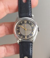 Doxa steel-cased bicolor dial military-style wristwatch 1946