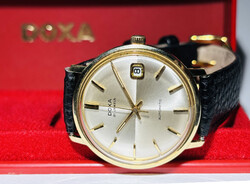 Gyönyörű gyári aranytokos (14 K) DOXA órás garancia géppel állított pontosság átmérő:34 mm k.n. bőrs