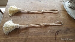 Bézsszínű függönyelkötő pár