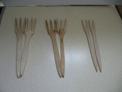 Pickled vegetables, cabbage small tongs wooden fork pairs