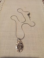 New, tagged costume jewelry necklace with lily of the valley pendant