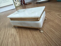 Fairytale white marble jewelry box with lion legs and green interior.