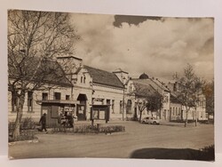 Old postcard Sturovo Párkány street scene with shops and vintage car, 1950s–1960s