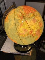 Globe that serves as both an illustrative tool and mood lighting. With Hungarian inscriptions.