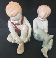 Retro Aquincum Porcelain Figurine Pair – Little Boy Tying His Shoe and Dressed Girl (László Kőműves)