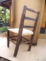 Antique handcrafted folk wooden chair