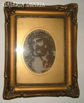 Jesus needle tapestry in blonde frame.
