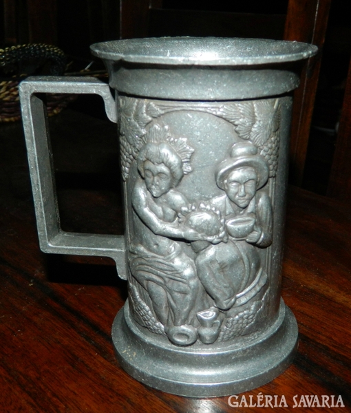 Extra embossed, extra old pewter cup with ears