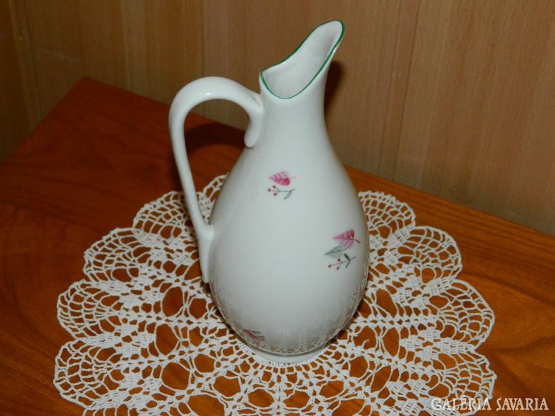 An old, rare, raven-shaped carafe-shaped vase for a flower