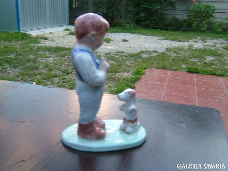 Antique signed ceramic sculpture: child with dog