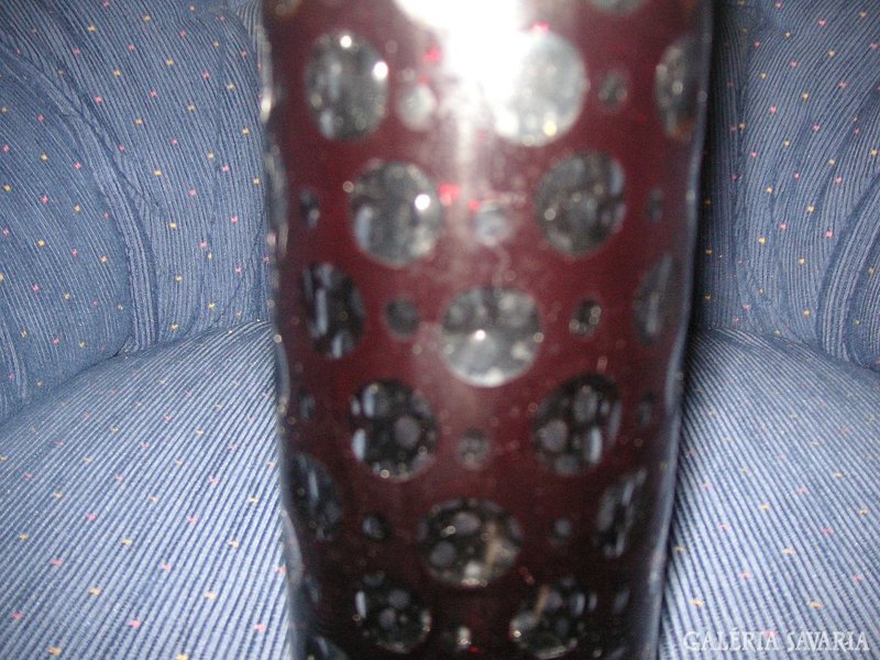 A glass vase of polished lips
