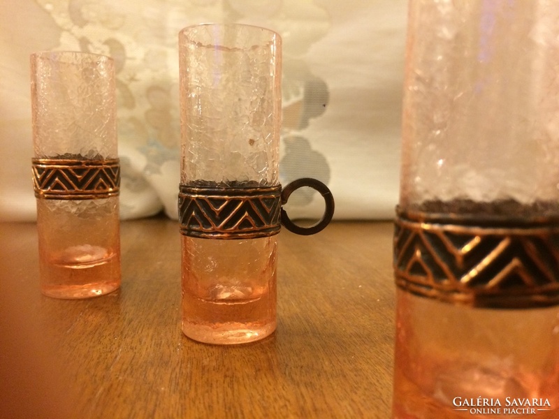 Very special peach liqueur glasses with copper pliers