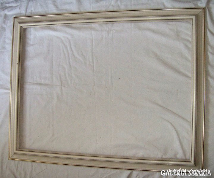Frame, picture frame, bone color with gold borders.