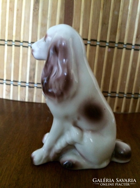 Raven house dog sculpture