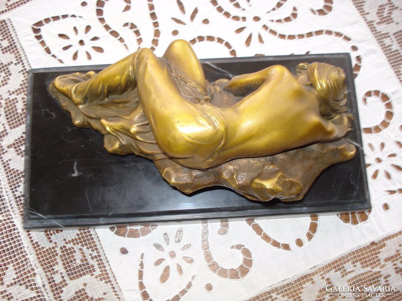 Resting girl - bronze sculpture, on a marble base