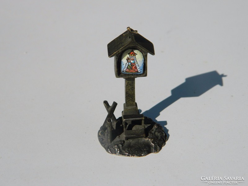 Antique bronze charm with fire enamel inlay