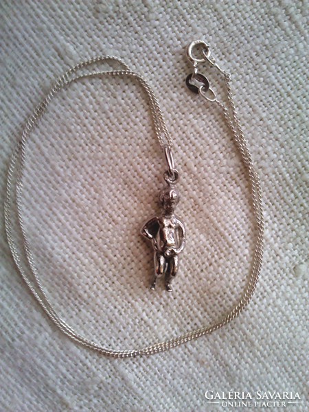 Marked silver chain with silver peeing boy with pendant