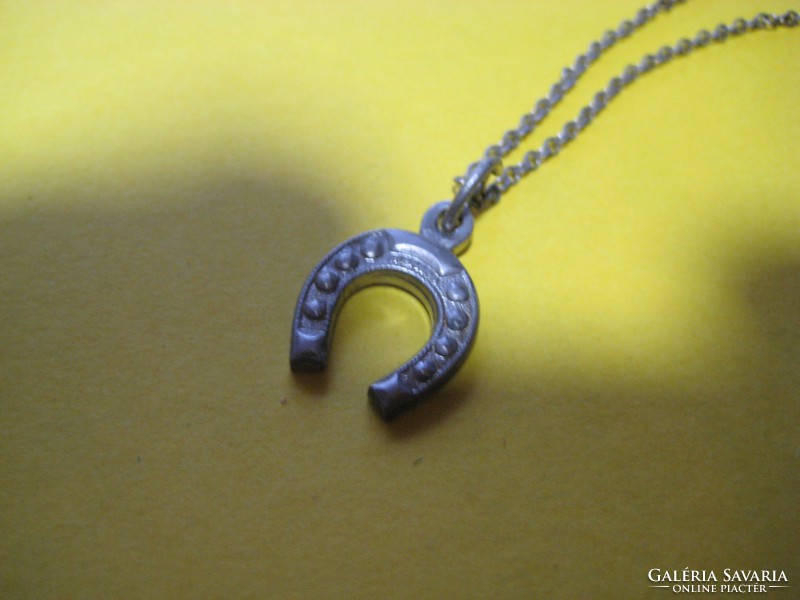 Necklace of luck with horseshoes