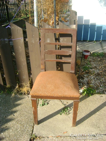 Antique sprung chair with padded back