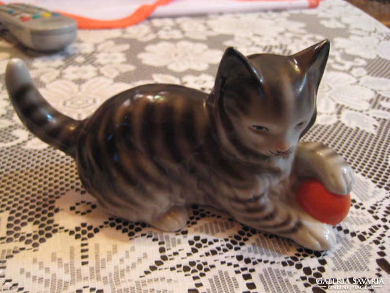 A playful porcelain kitten