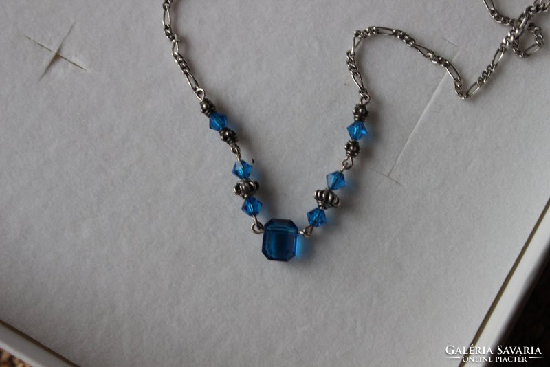 Silver necklace with blue zircon