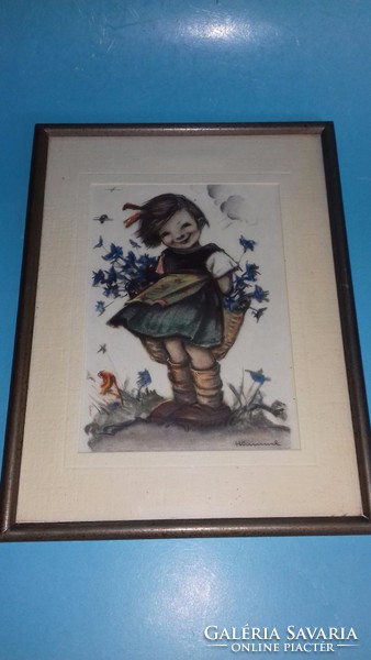 Hummel picture in a frame of a little girl with flowers