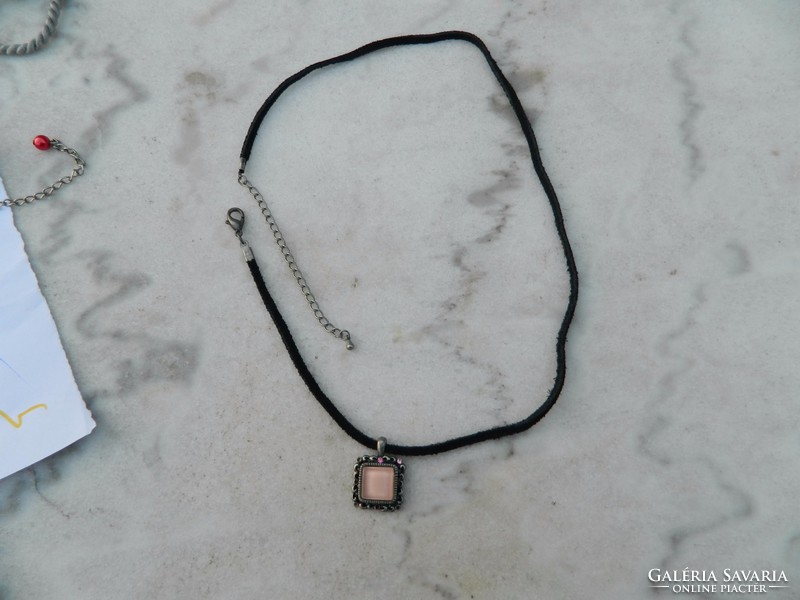 Pendant with pink stone on a leather strap - necklace