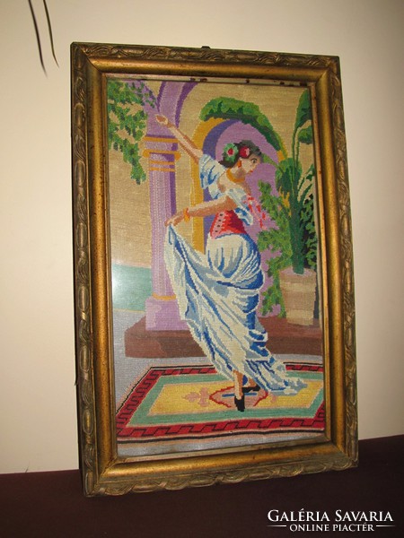 Showy tapestry image, dancer.