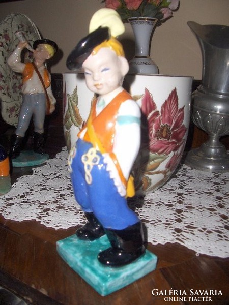 Large ceramic peasant boy with hops