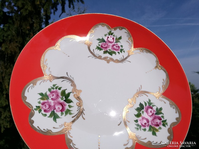 A pink Russian decorative plate from Soviet times