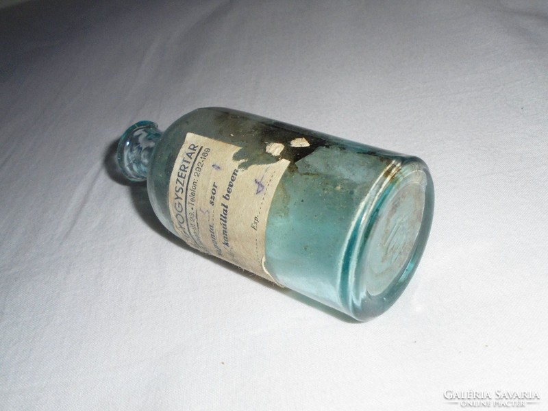 Old medicinal glass bottle - angel pharmacy - field pharmacist - from the 1920s