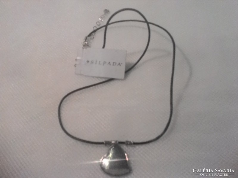 Silver pendant with black leather chain
