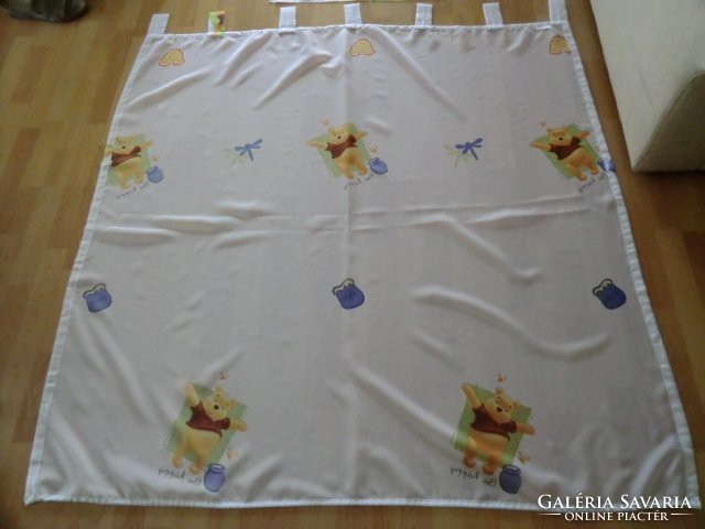 Children's room with pooh curtains with rods