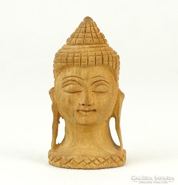 0Q140 Buddhista fafaragás Buddhafej