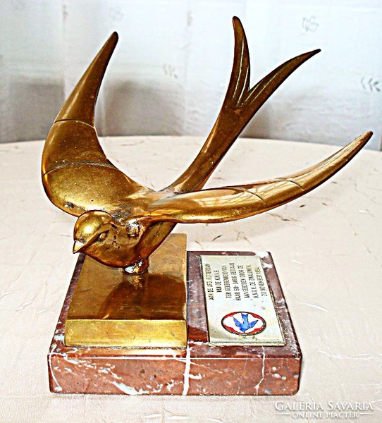 Hagenauer-style bronze sculpture depicting a swallow, leaf weight.